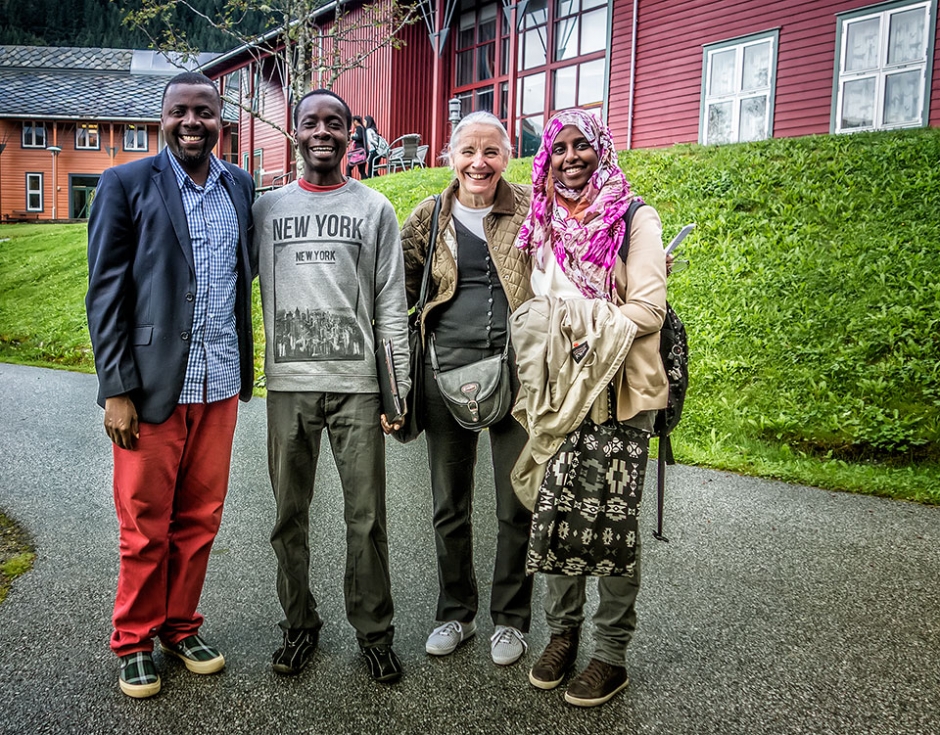 Saye-Maye Cole (left) with students and SOS representative Vibeke Mortensen