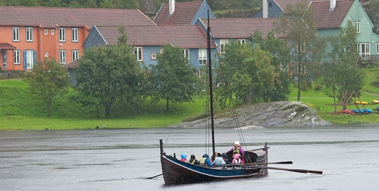 A traditional west coast boat. Here used by leirskule. The student village is behind