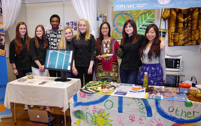 RCN Students Daniel, Iman and Jasmine with students from local schools at the Sogndal County Fair