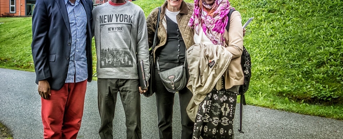 Saye-Maye Cole (left) with students and SOS representative Vibeke Mortensen