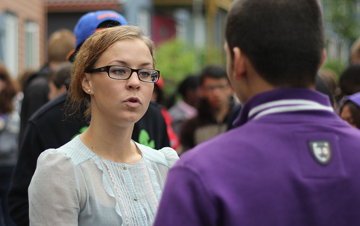 Susanne Gabrielsen talking to one of the students during a visit to the College