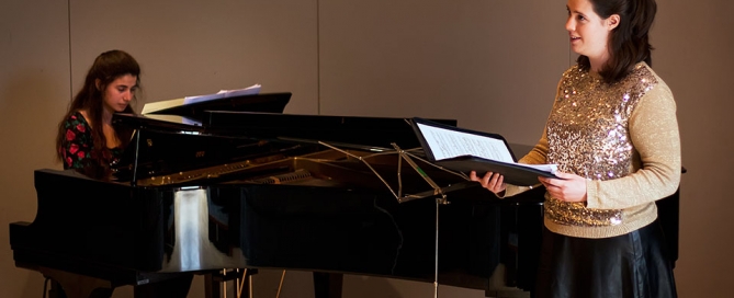 During the recital. Christina on piano, Aileen singing.