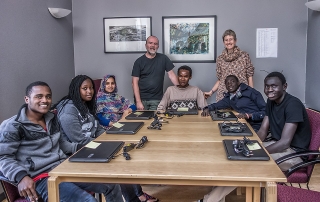 Students receiving laptops