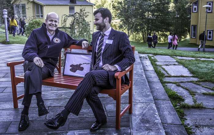 Sven Mollekleiv and Larry - having presented the College with a Red Cross bench